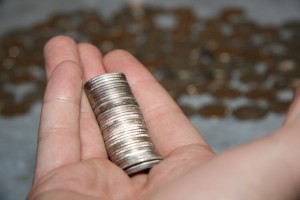 Holding a stack of coins in my hand
